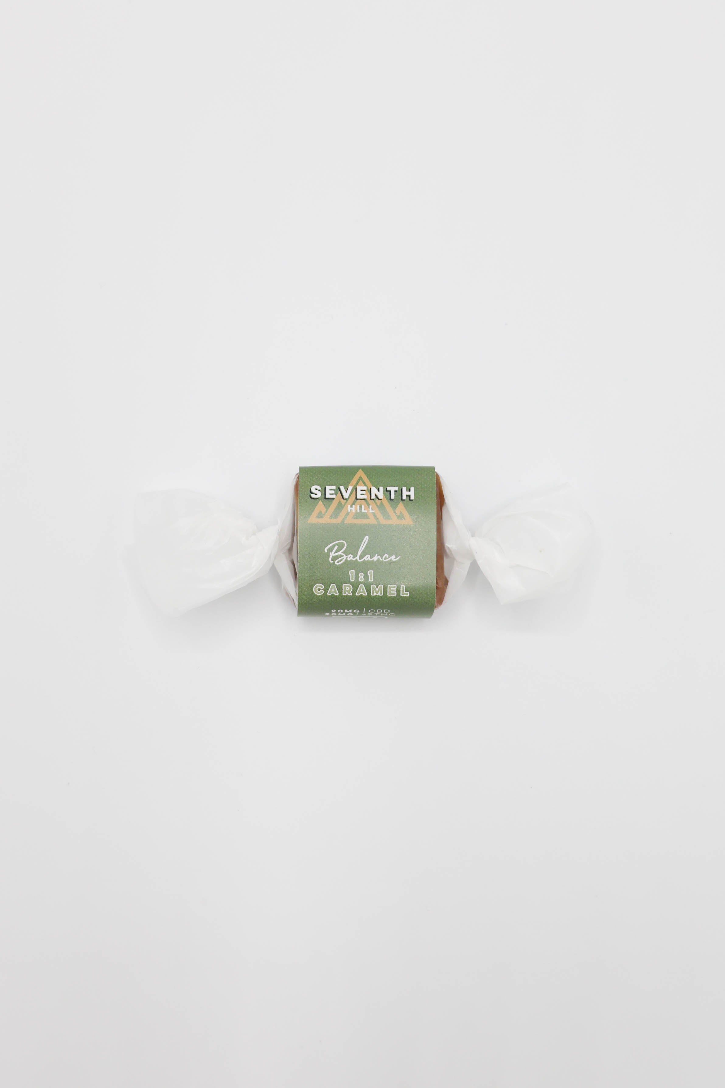 A single wrapped candy from the brand Seventh, labeled 'Balance 1:1 Caramel', shown on a clean white background.