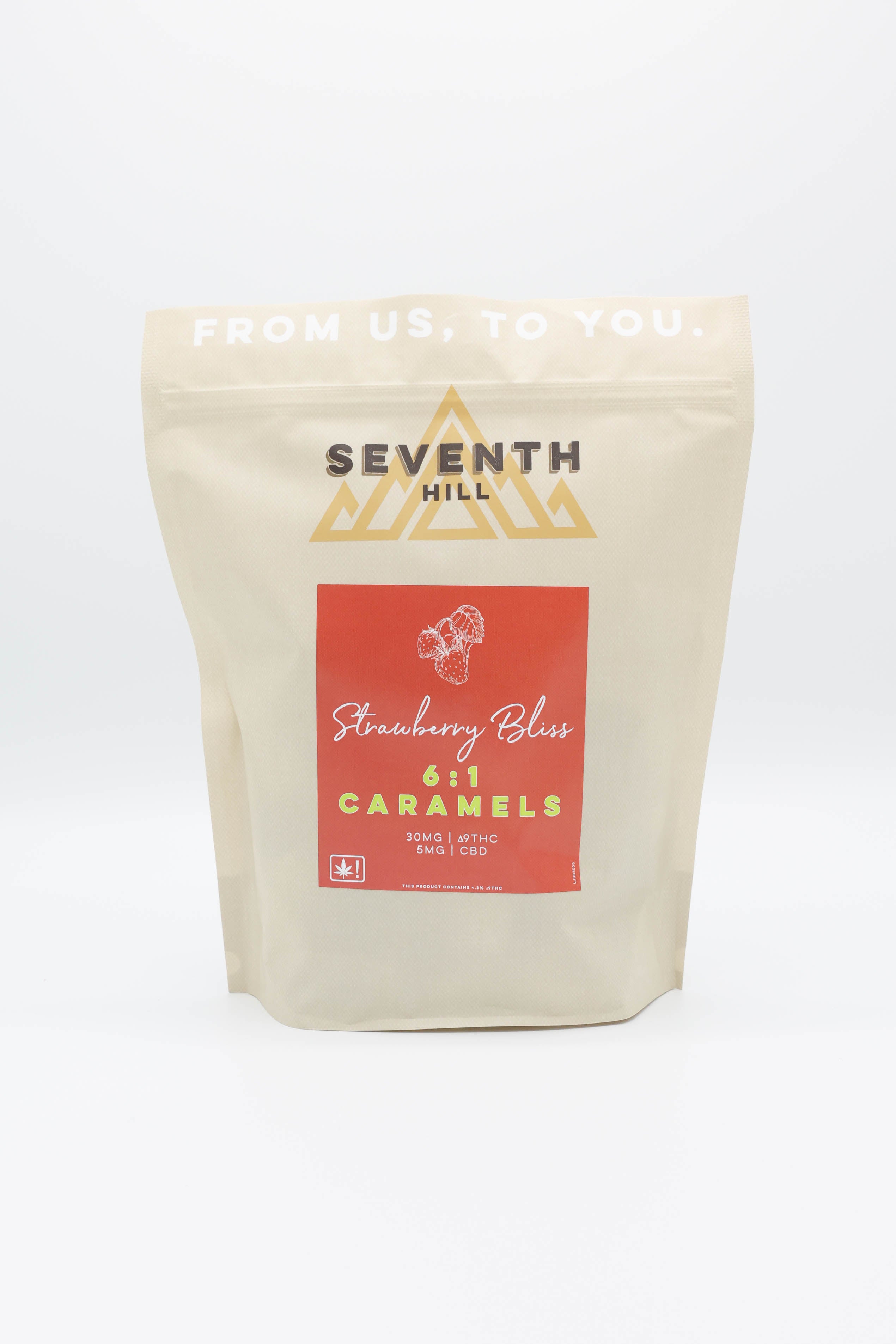 A stand-up pouch of Seventh Hill CBD Strawberry Bliss 6:1 Caramels on a clean white background.